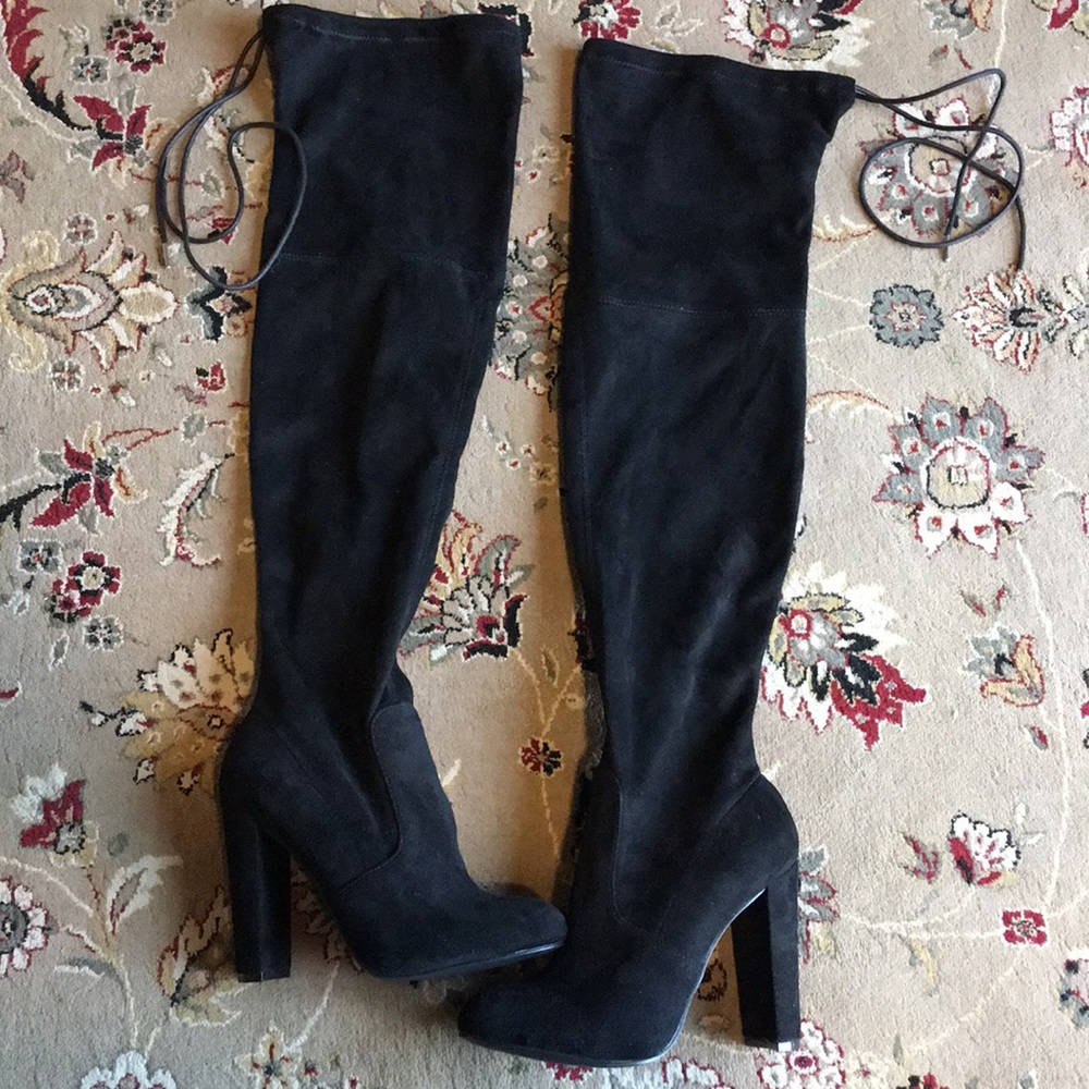 Thigh high heeled boots